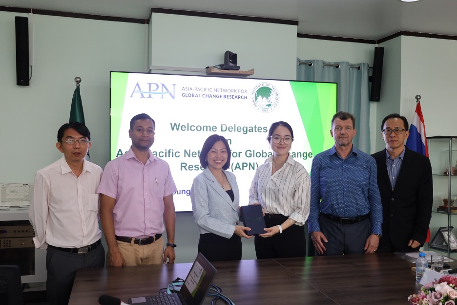 APN delegate with AIT officials