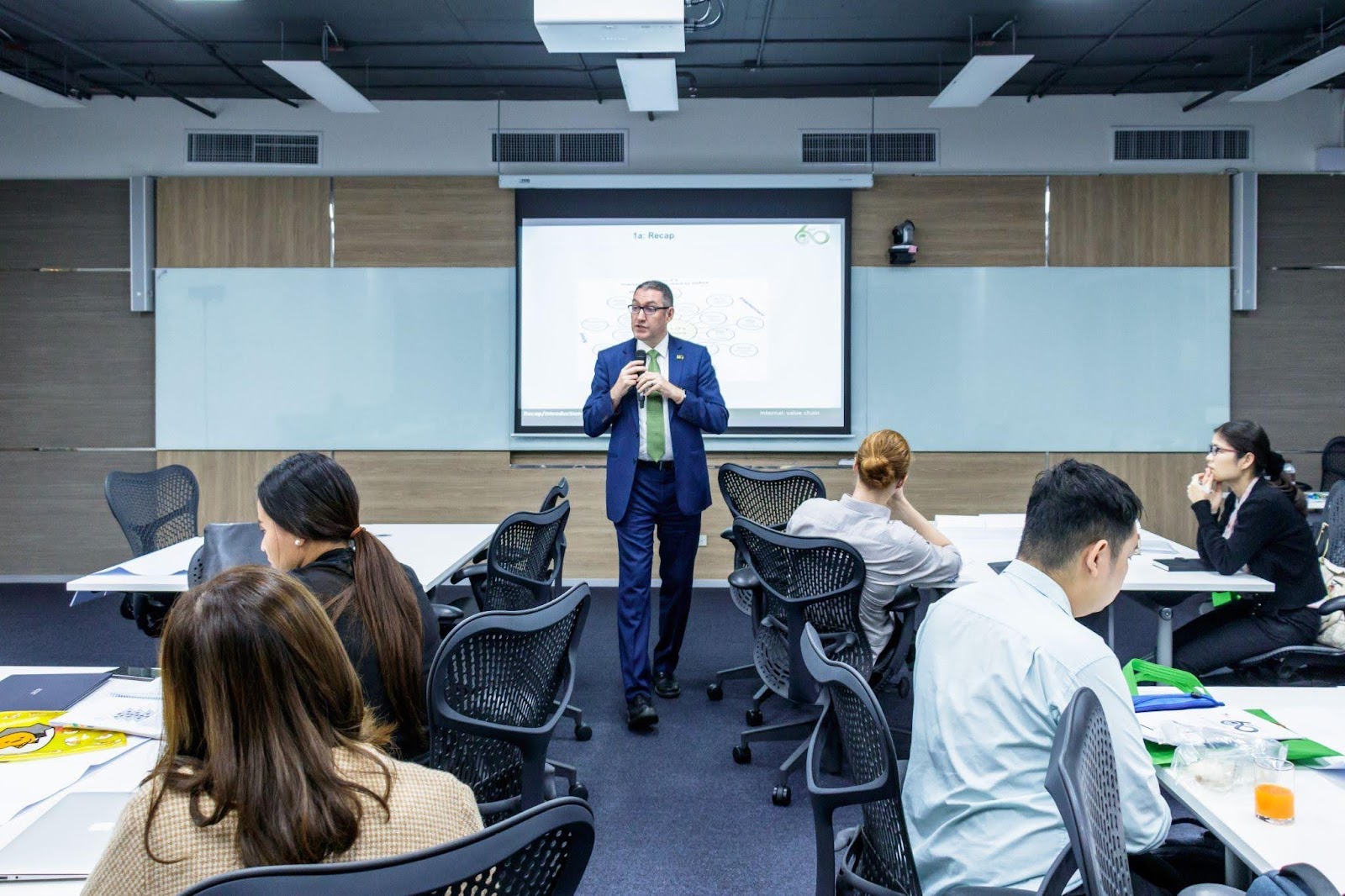 Dr. Roger teaching in class