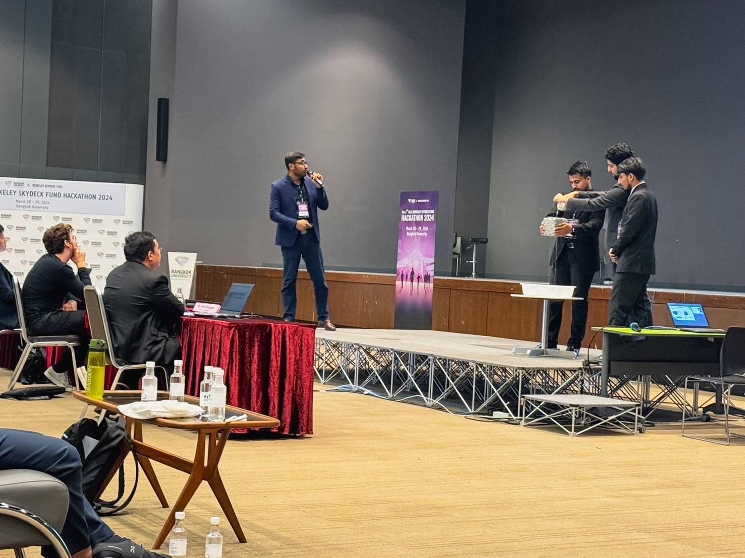 Team Excel in stone demonstrating their idea of thirsty concrete